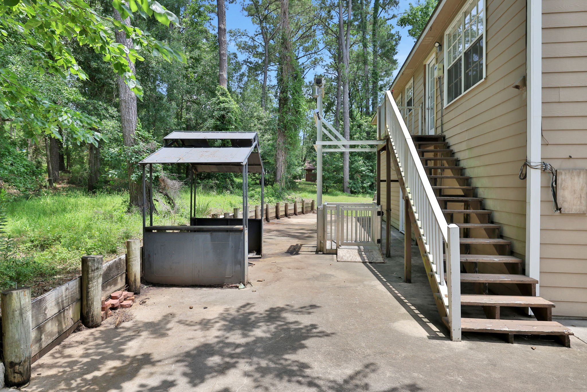 360 Holiday Lane Coldspring, TX 77331 - Photo 25 of 40 There is an elevator at the back of the home to get between the two floors
