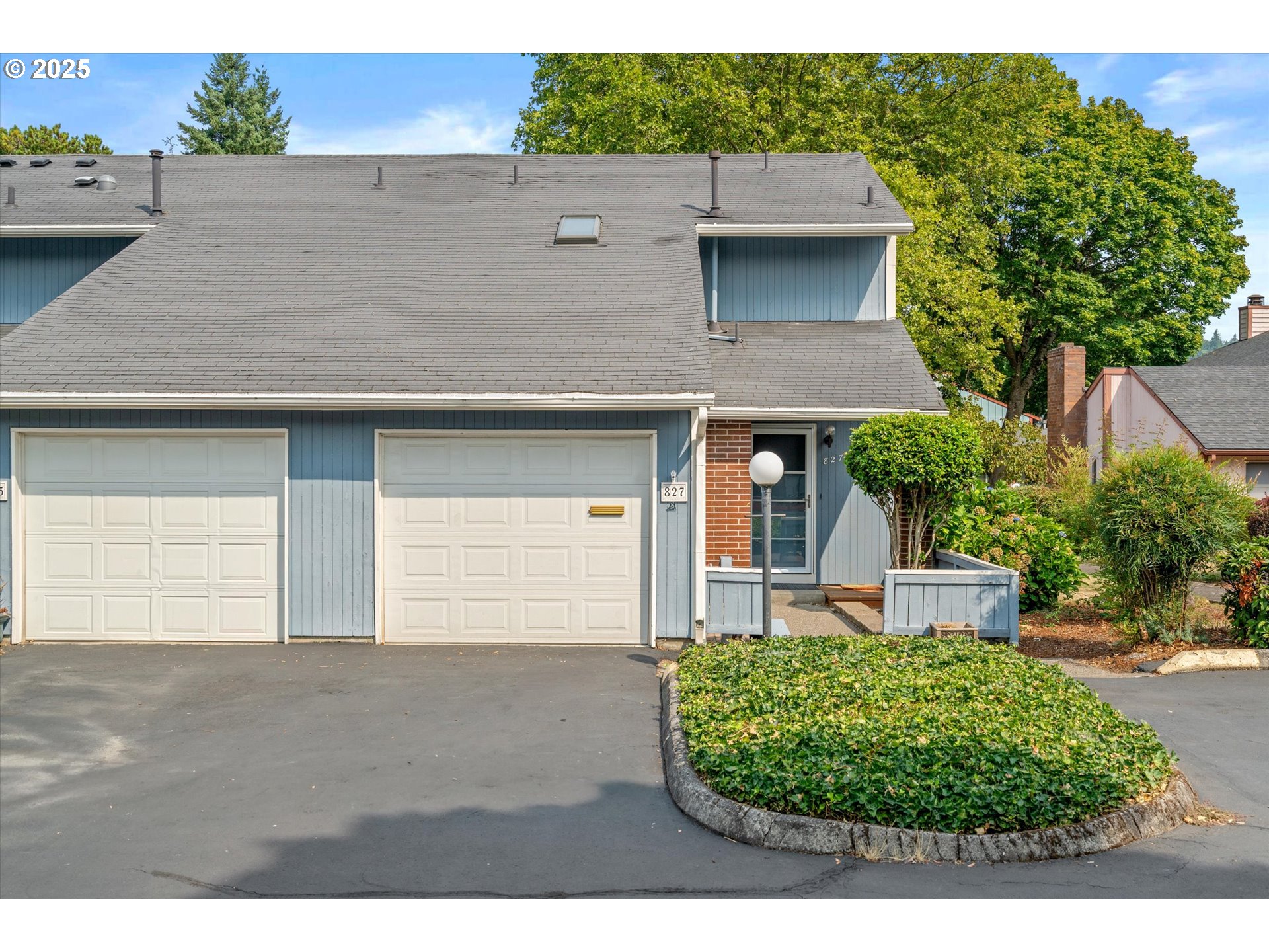 a view of a house with a garden