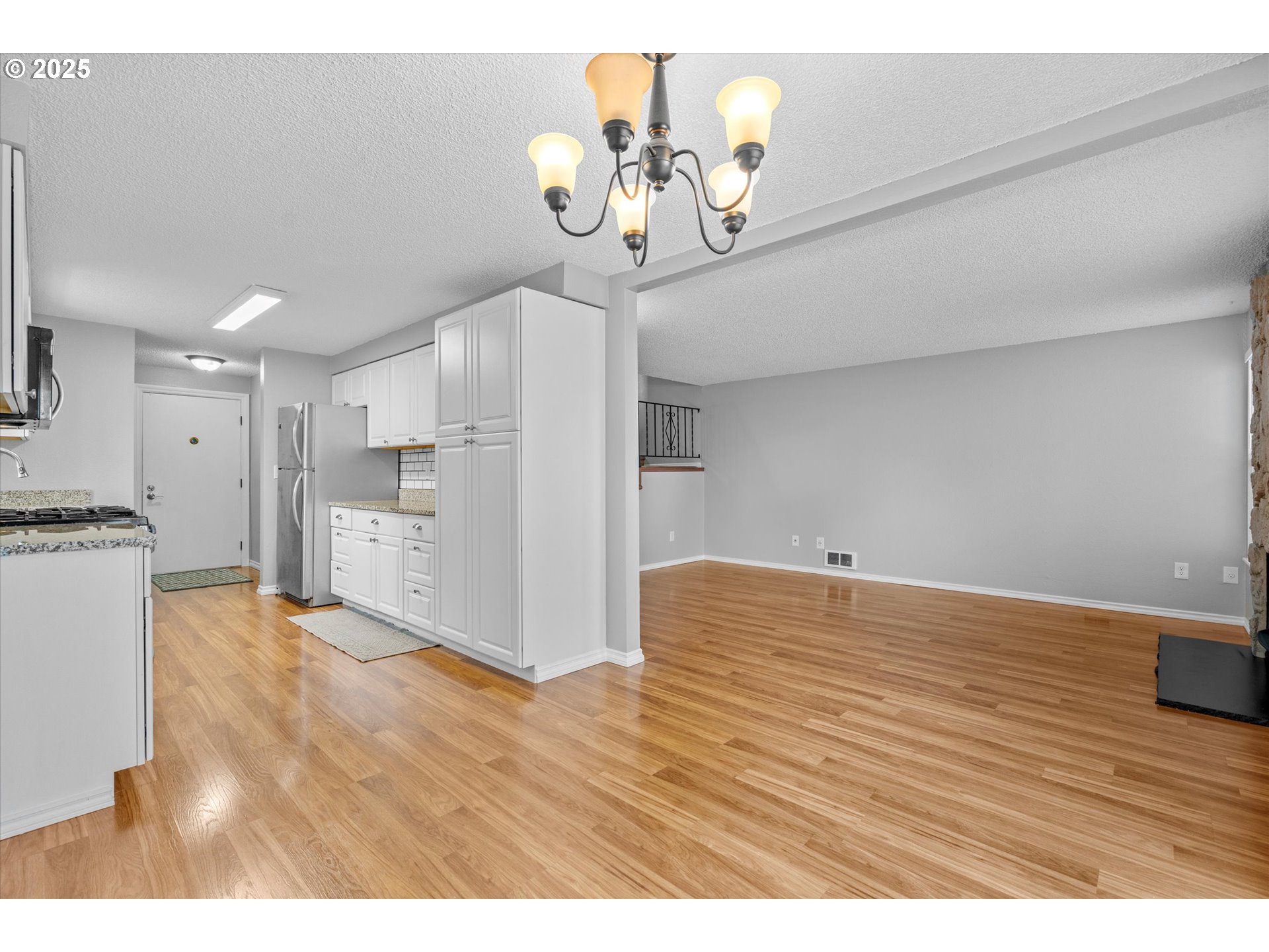 827 Northeast 90th Avenue Portland, OR 97220 - Photo 13 of 38 a view of a livingroom with a kitchen