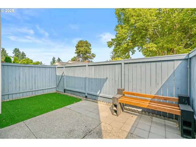 a view of a houses and a yard