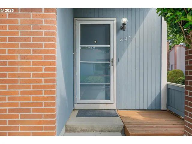a open kitchen with stainless steel appliances granite countertop a sink stove and refrigerator