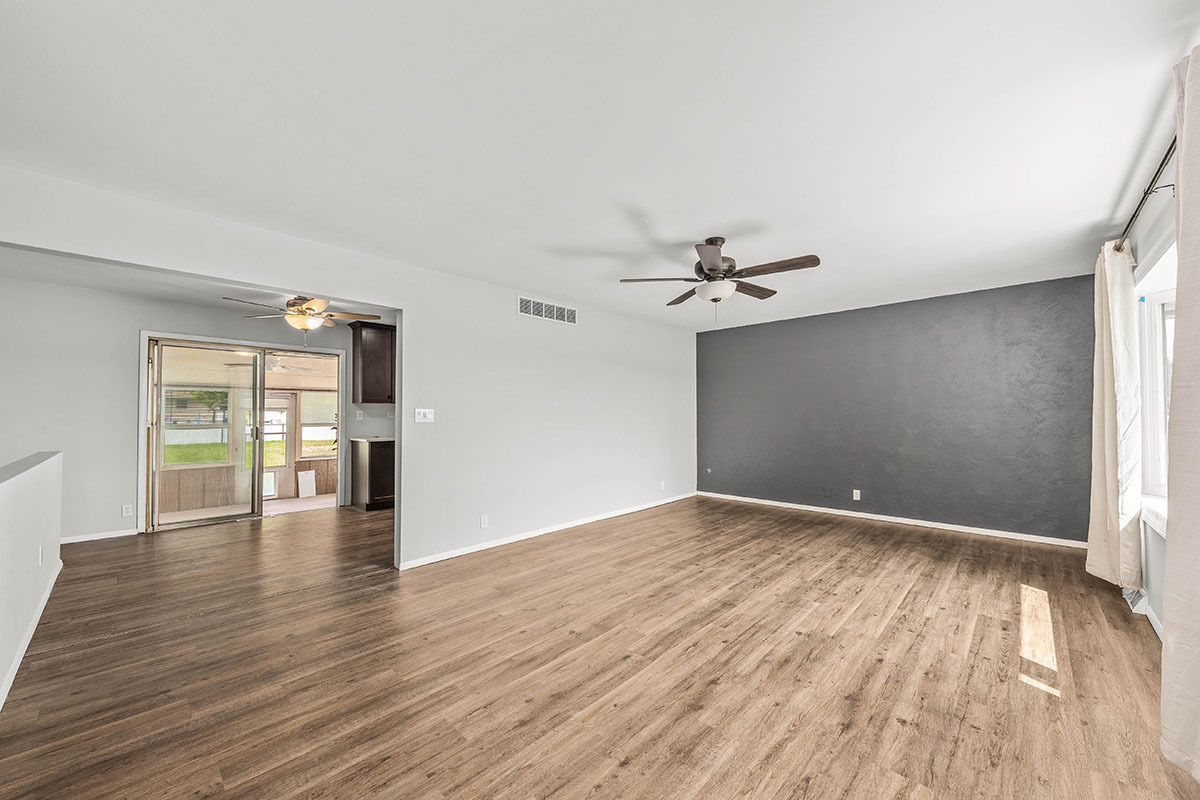 815 Bronk Road Joliet, IL 60404 - Photo 2 of 23 a view of empty room with wooden floor
