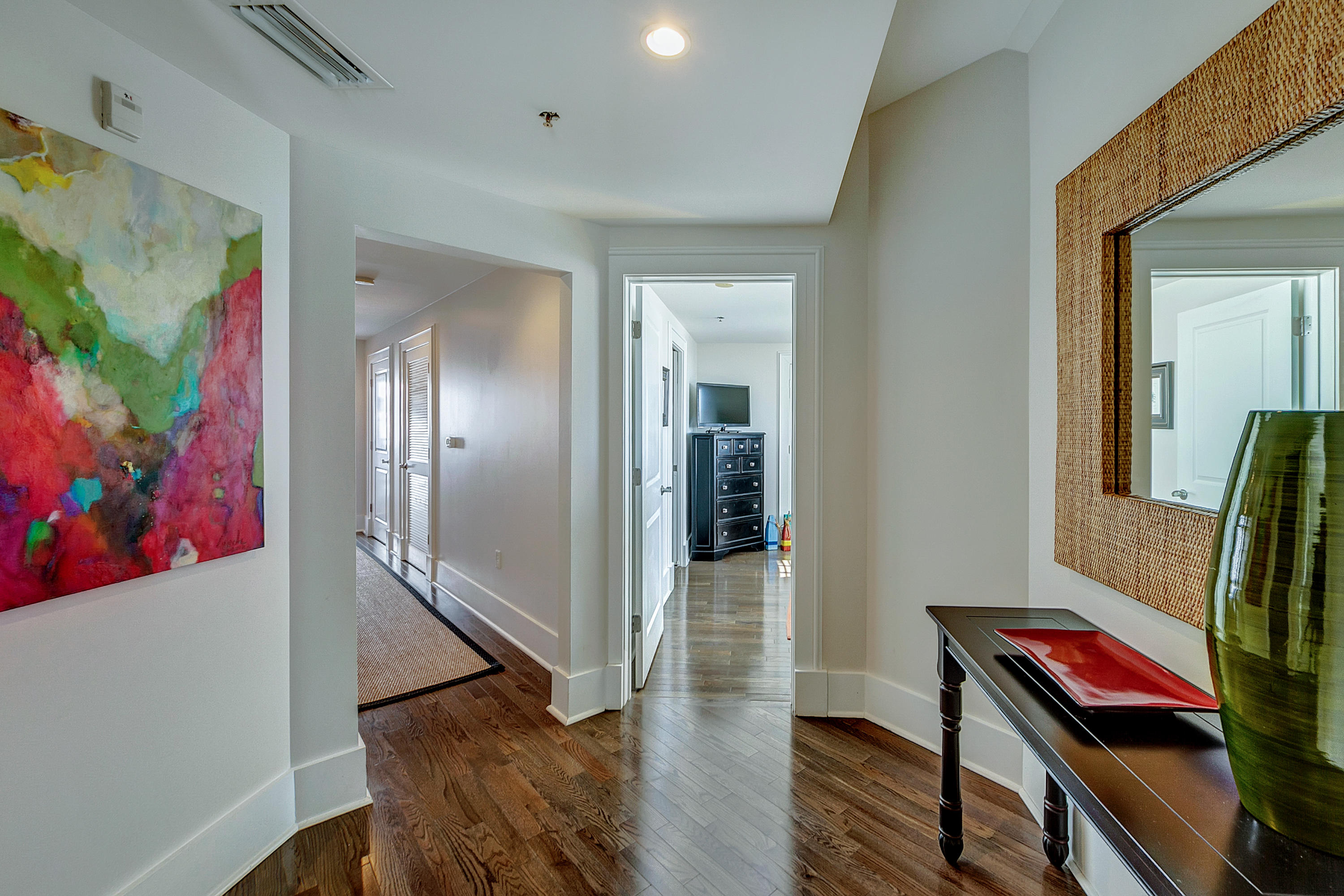 5 Main Street, Unit 1F Rosemary Beach, FL 32461 - Photo 12 of 24 a view of a hallway with workspace and wooden floor