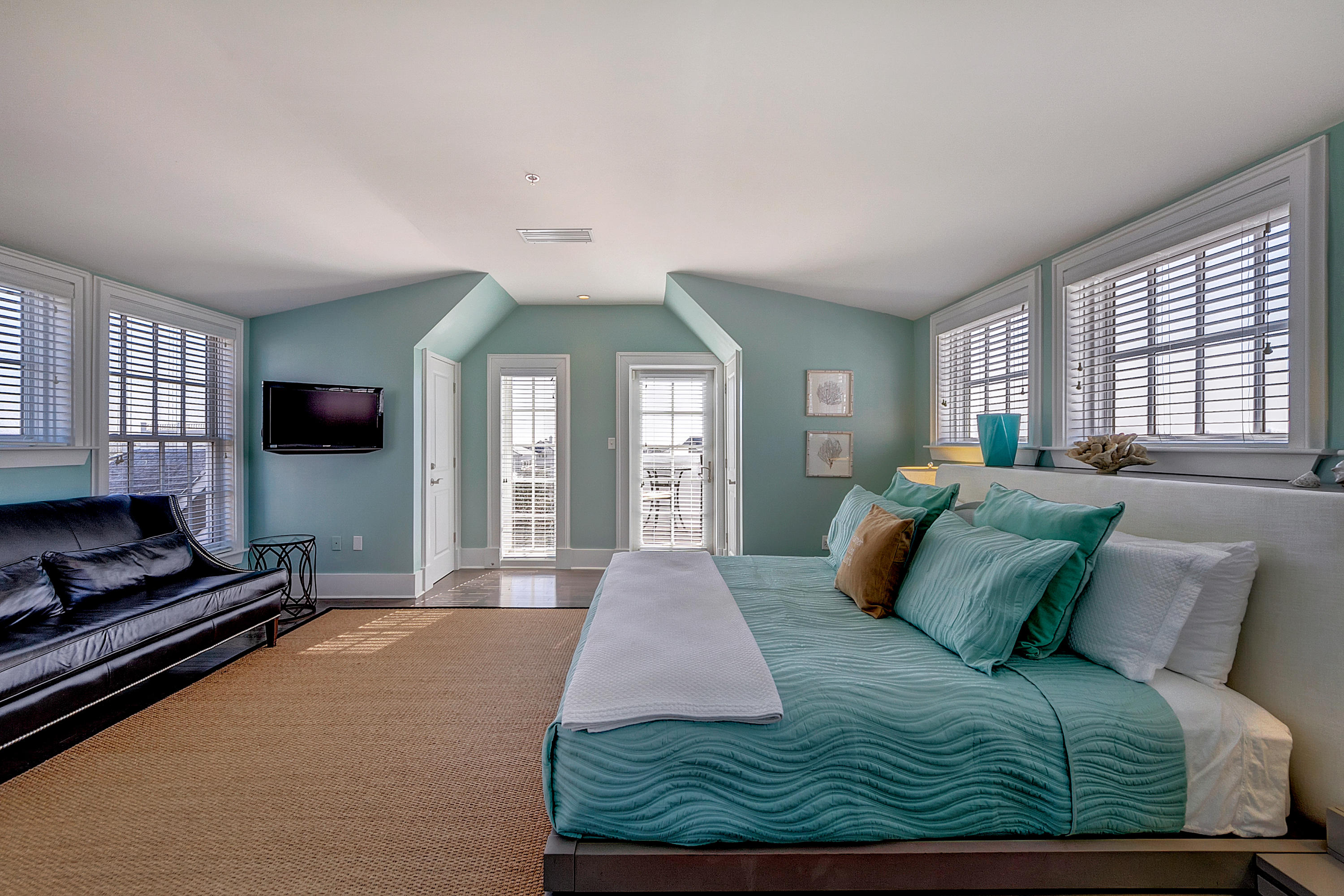5 Main Street, Unit 1F Rosemary Beach, FL 32461 - Photo 13 of 24 a bed sitting in a bedroom next to a window