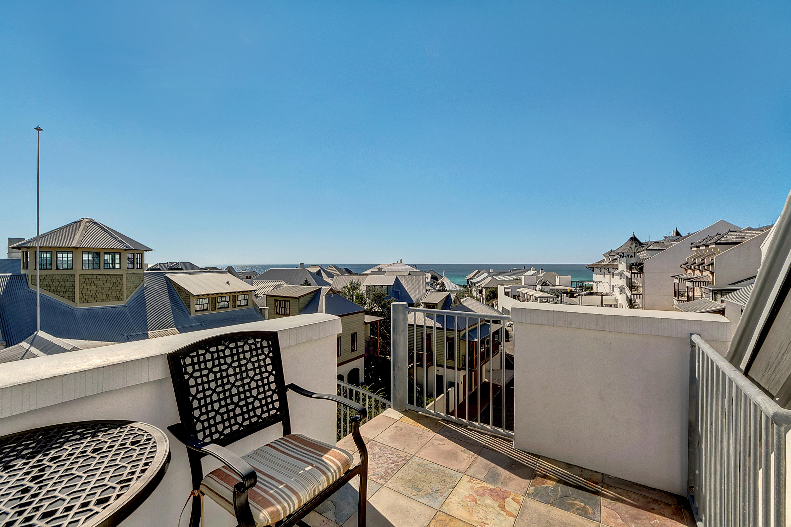 5 Main Street, Unit 1F Rosemary Beach, FL 32461 - Photo 16 of 24 a view of a terrace with chairs
