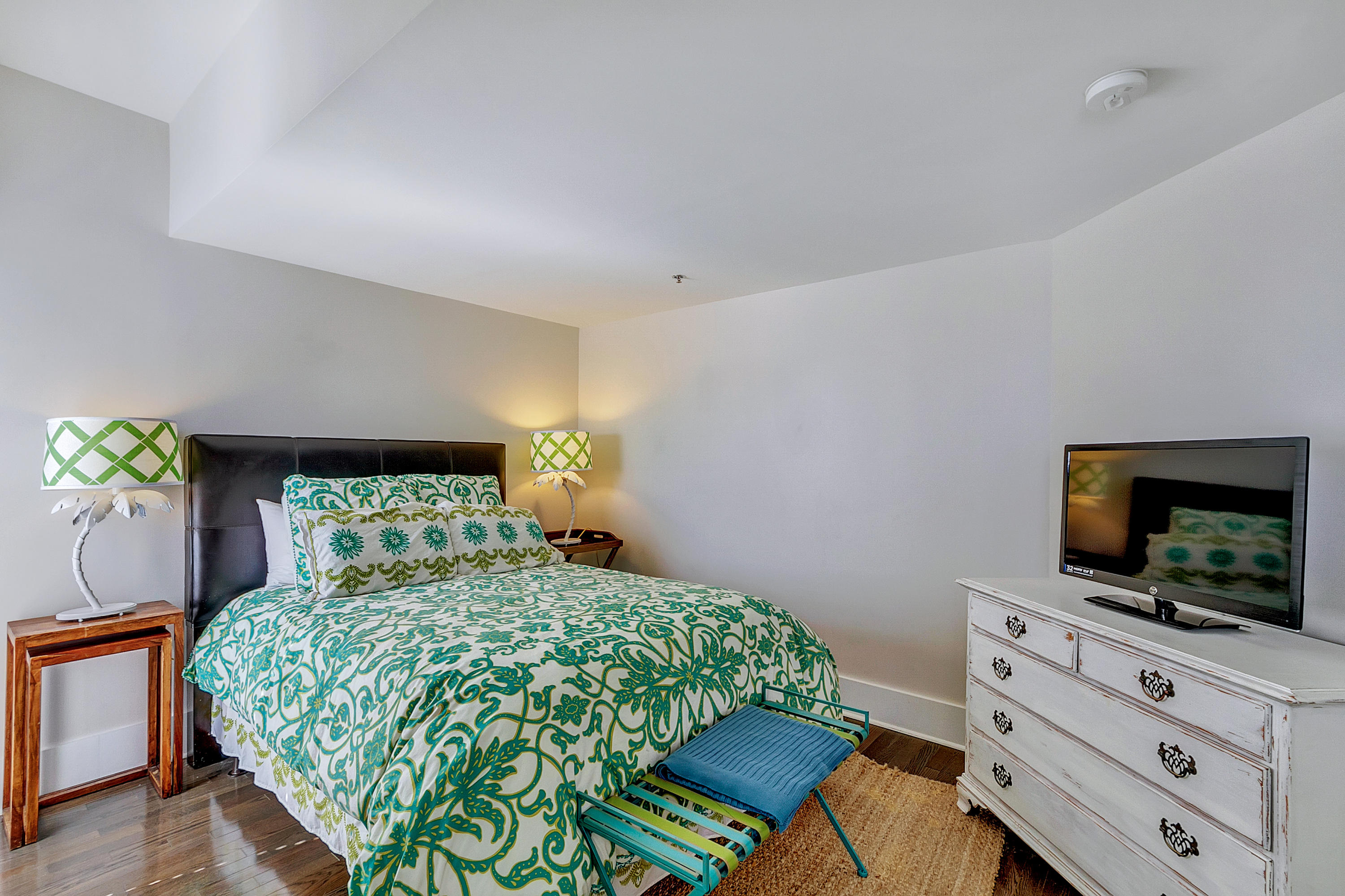 5 Main Street, Unit 1F Rosemary Beach, FL 32461 - Photo 19 of 24 a bedroom with a bed and flat screen tv