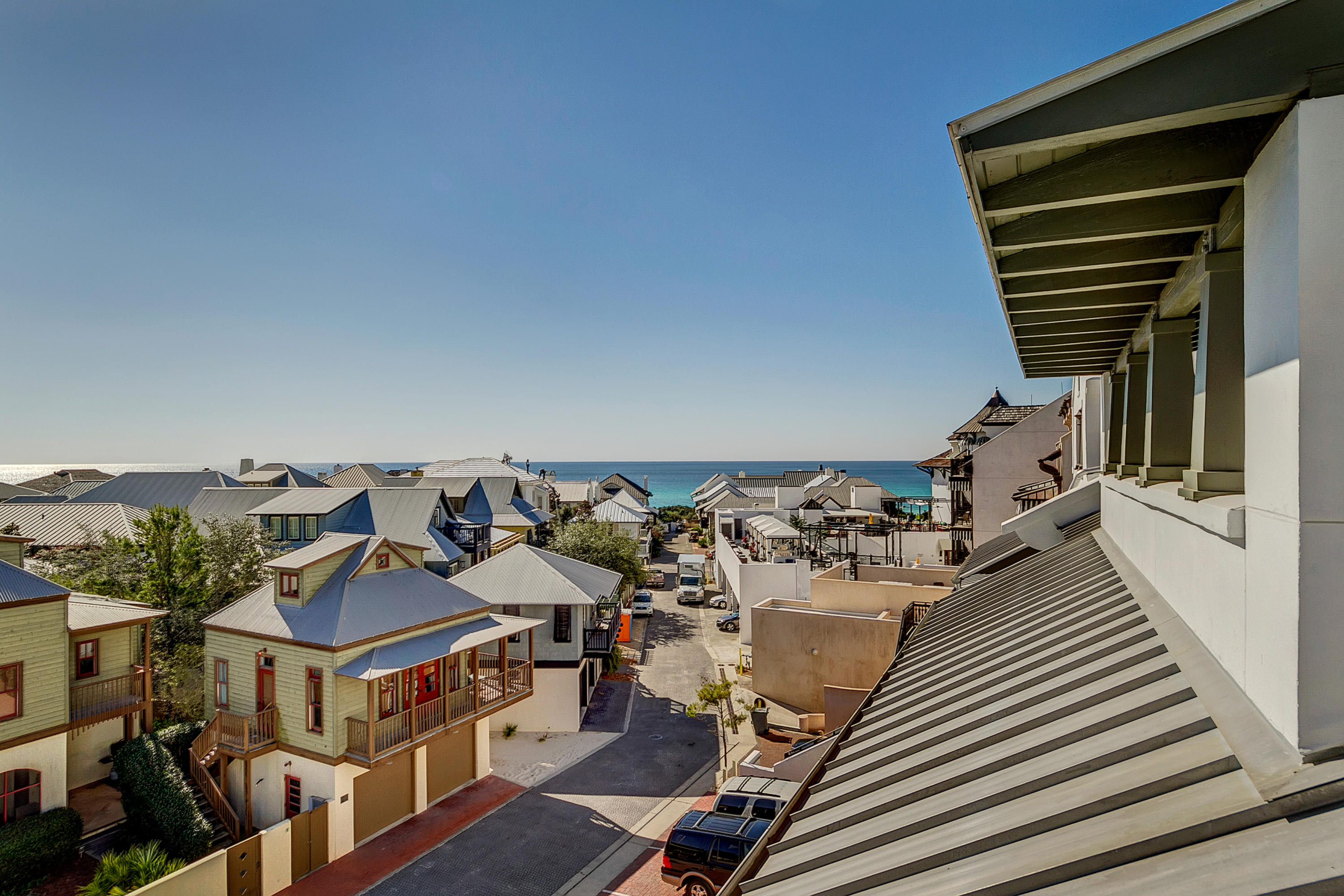 5 Main Street, Unit 1F Rosemary Beach, FL 32461 - Photo 24 of 24 a view of a house with pool and chairs