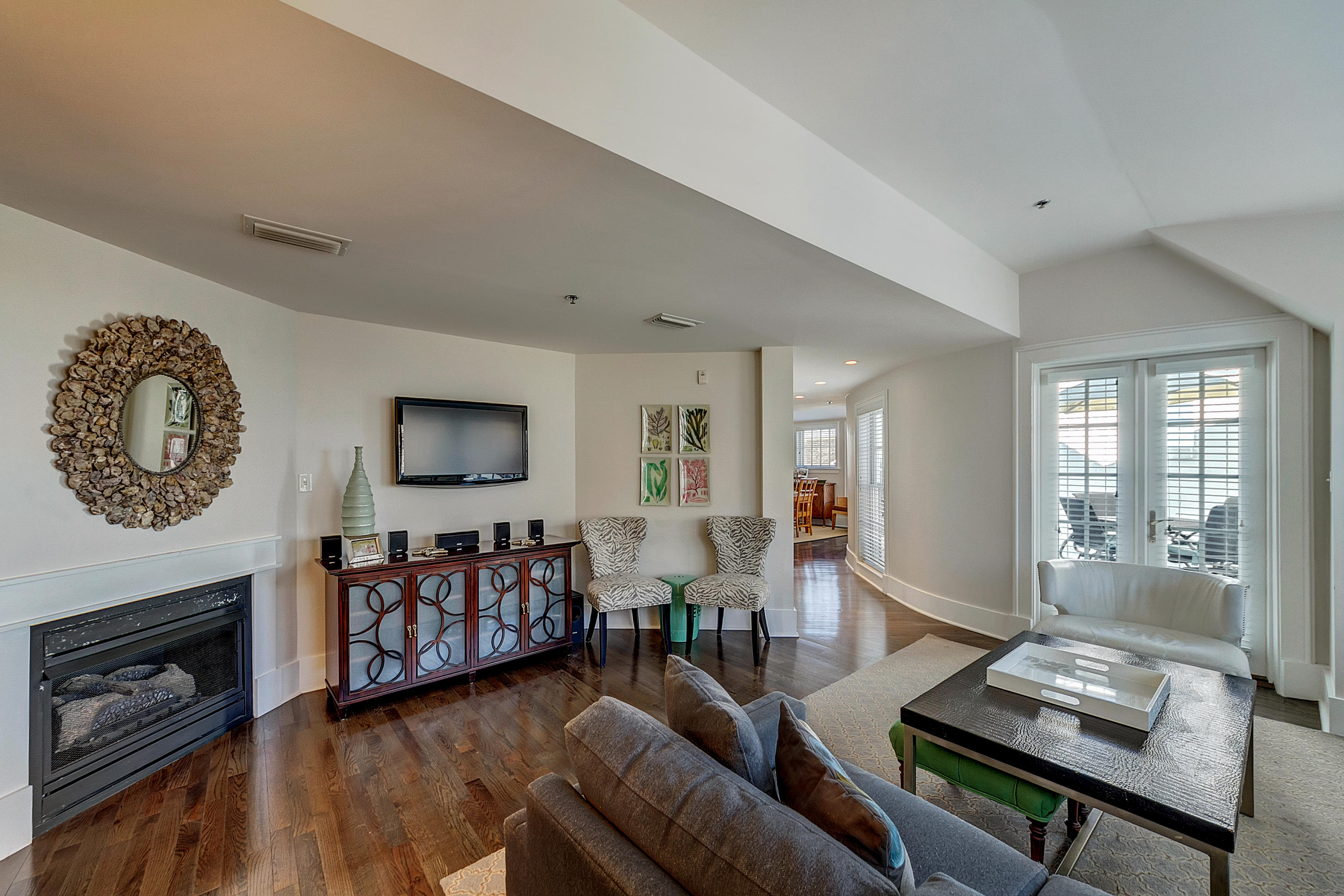5 Main Street, Unit 1F Rosemary Beach, FL 32461 - Photo 10 of 24 a living room with furniture and a fireplace