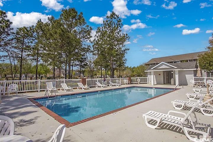 4850 Meadowsweet Drive, Unit 1711 Myrtle Beach, SC 29579 - Photo 39 of 39 Community pool with a patio area