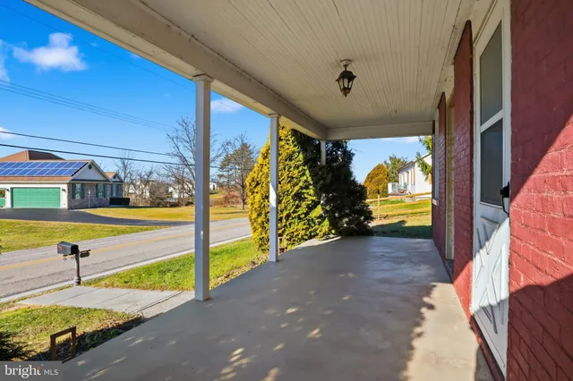 a view of a swimming pool with a lounge chairs