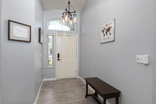 a view of workspace with window and hallway