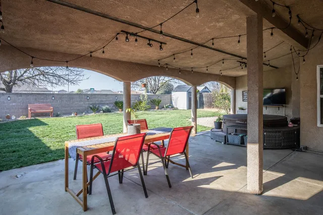 a view of yard with seating area and furniture