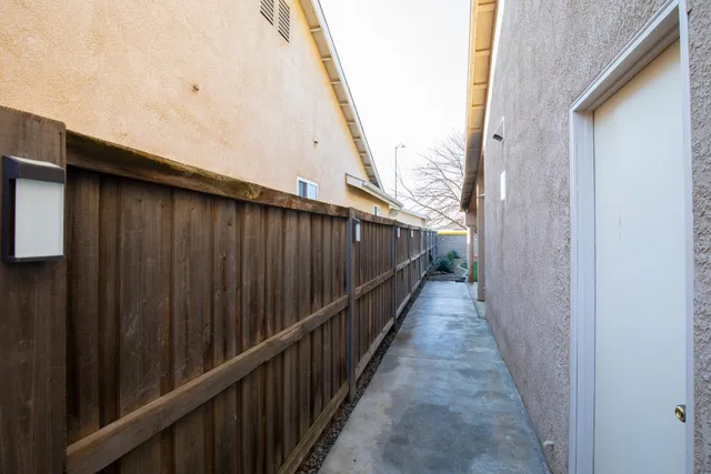a view of a balcony with wooden floor