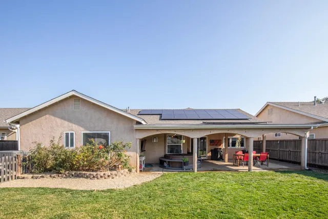 a front view of a house with patio