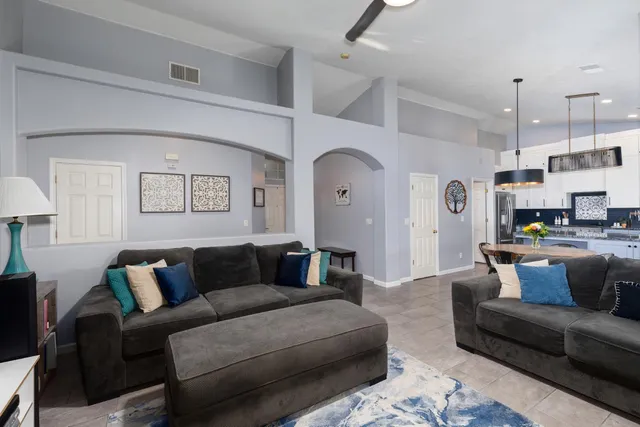 a living room with furniture and a couch