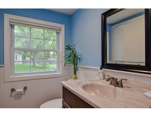 15 Hadley Road Framingham, MA 01701 - Photo 12 of 26 a bathroom with a sink and a mirror