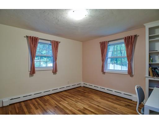 15 Hadley Road Framingham, MA 01701 - Photo 14 of 26 a view of an empty room with window and wooden floor