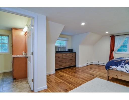 15 Hadley Road Framingham, MA 01701 - Photo 16 of 26 a bedroom with a bed and a dresser in it