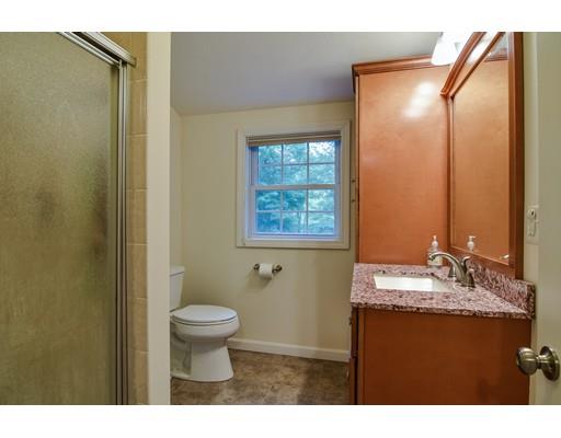 15 Hadley Road Framingham, MA 01701 - Photo 17 of 26 a bathroom with a granite countertop sink toilet and mirror