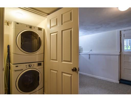 15 Hadley Road Framingham, MA 01701 - Photo 20 of 26 a view of a storage & utility room with washer and dryer