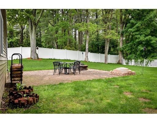 15 Hadley Road Framingham, MA 01701 - Photo 21 of 26 a view of backyard with a table and chairs