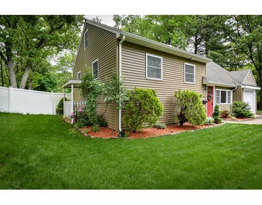 15 Hadley Road Framingham, MA 01701 - Photo 26 of 26 a backyard of a house with potted plants and large tree