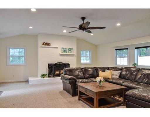 15 Hadley Road Framingham, MA 01701 - Photo 3 of 26 a living room with furniture a couch and a window