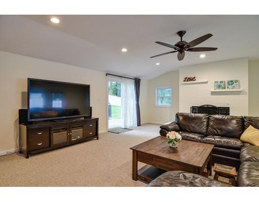 15 Hadley Road Framingham, MA 01701 - Photo 4 of 26 a living room with furniture and a flat screen tv
