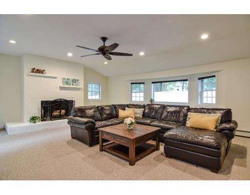 15 Hadley Road Framingham, MA 01701 - Photo 5 of 26 a living room with furniture a fireplace and a window