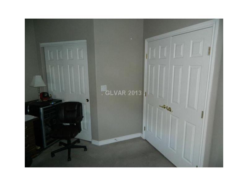 1024 Norellat Road Henderson, NV 89011 - Photo 16 of 35 Bedroom. DOUBLE DOOR ENTRY AND CLOSET AREA IN THE DOWNSTAIRS BEDROOM