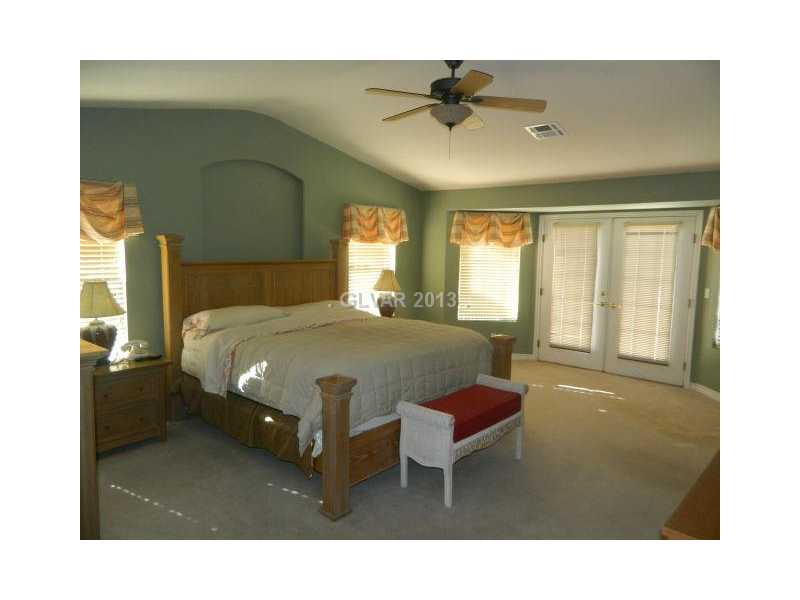 1024 Norellat Road Henderson, NV 89011 - Photo 21 of 35 Master Bedroom. MASTER SUITE WITH FRENCH DOORS TO THE BALCONY