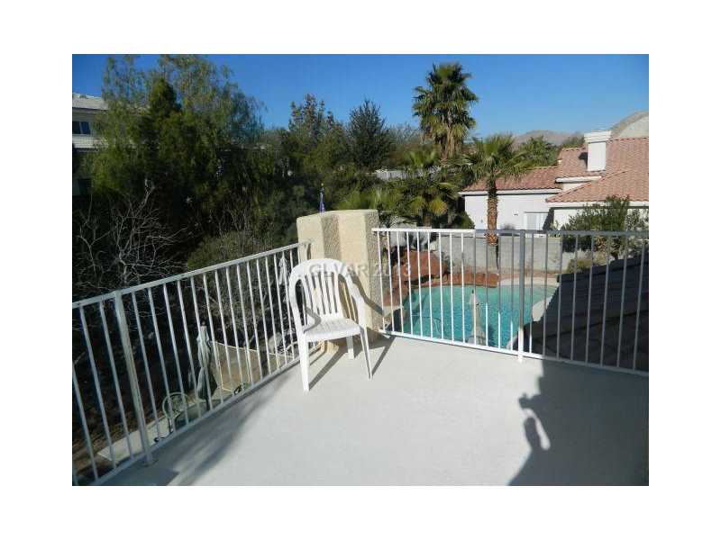 1024 Norellat Road Henderson, NV 89011 - Photo 24 of 35 Other. VIEW OF THE POOL FROM THE MASTER SUITE BALCONY