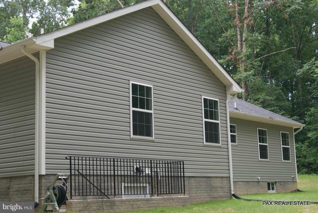 4430 Solomons Island Road Huntingtown, MD 20639 - Photo 1 of 17 a view of a house with a garage