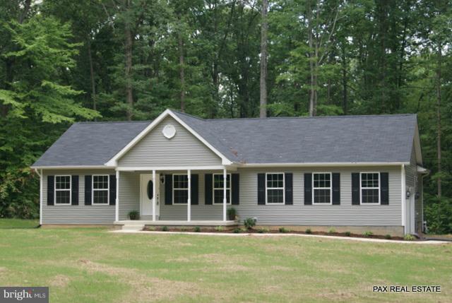 4430 Solomons Island Road Huntingtown, MD 20639 - Photo 17 of 17 front view of a house with a yard