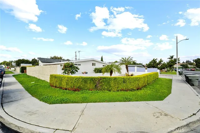 a view of a garden with a fountain