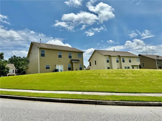 a view of a wrought iron fences in front of house