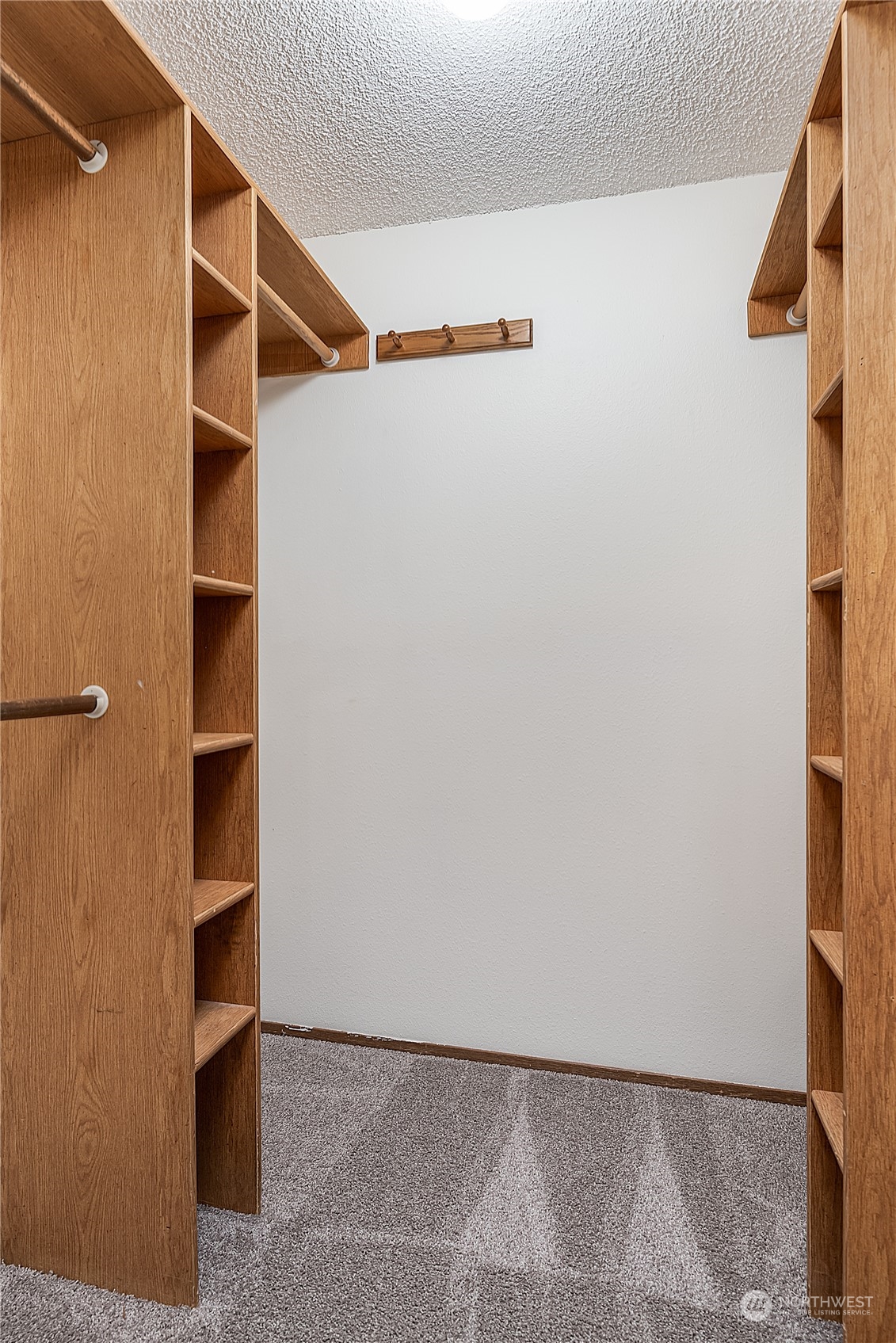 2723 166th Street Southeast Bothell, WA 98012 - Photo 18 of 31 a view of an empty walk in closet