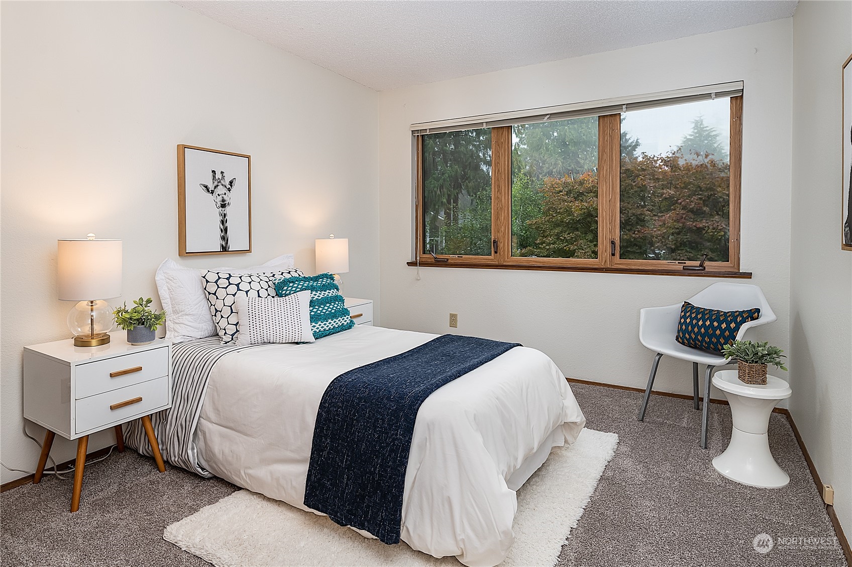 2723 166th Street Southeast Bothell, WA 98012 - Photo 19 of 31 a bedroom with a bed and a large window