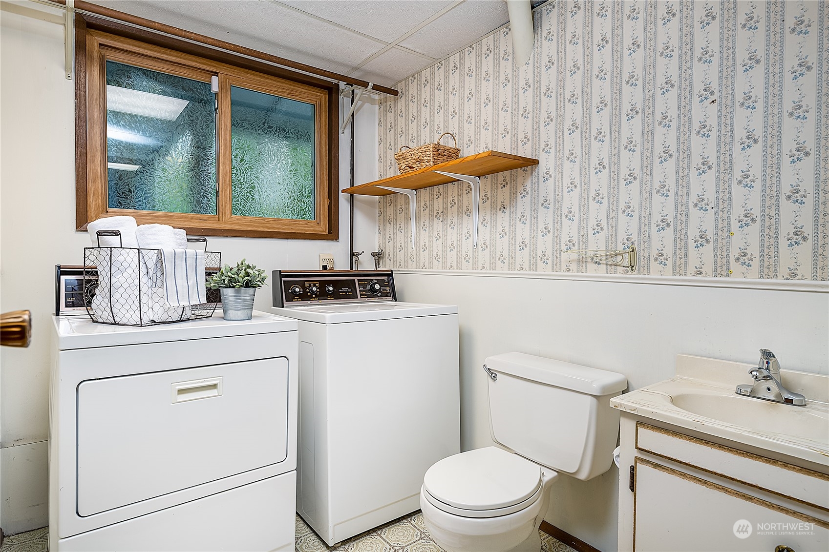2723 166th Street Southeast Bothell, WA 98012 - Photo 23 of 31 a bathroom with a sink a toilet and a mirror