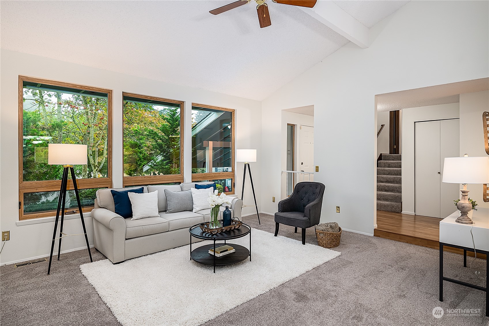 2723 166th Street Southeast Bothell, WA 98012 - Photo 5 of 31 a living room with furniture and a large window