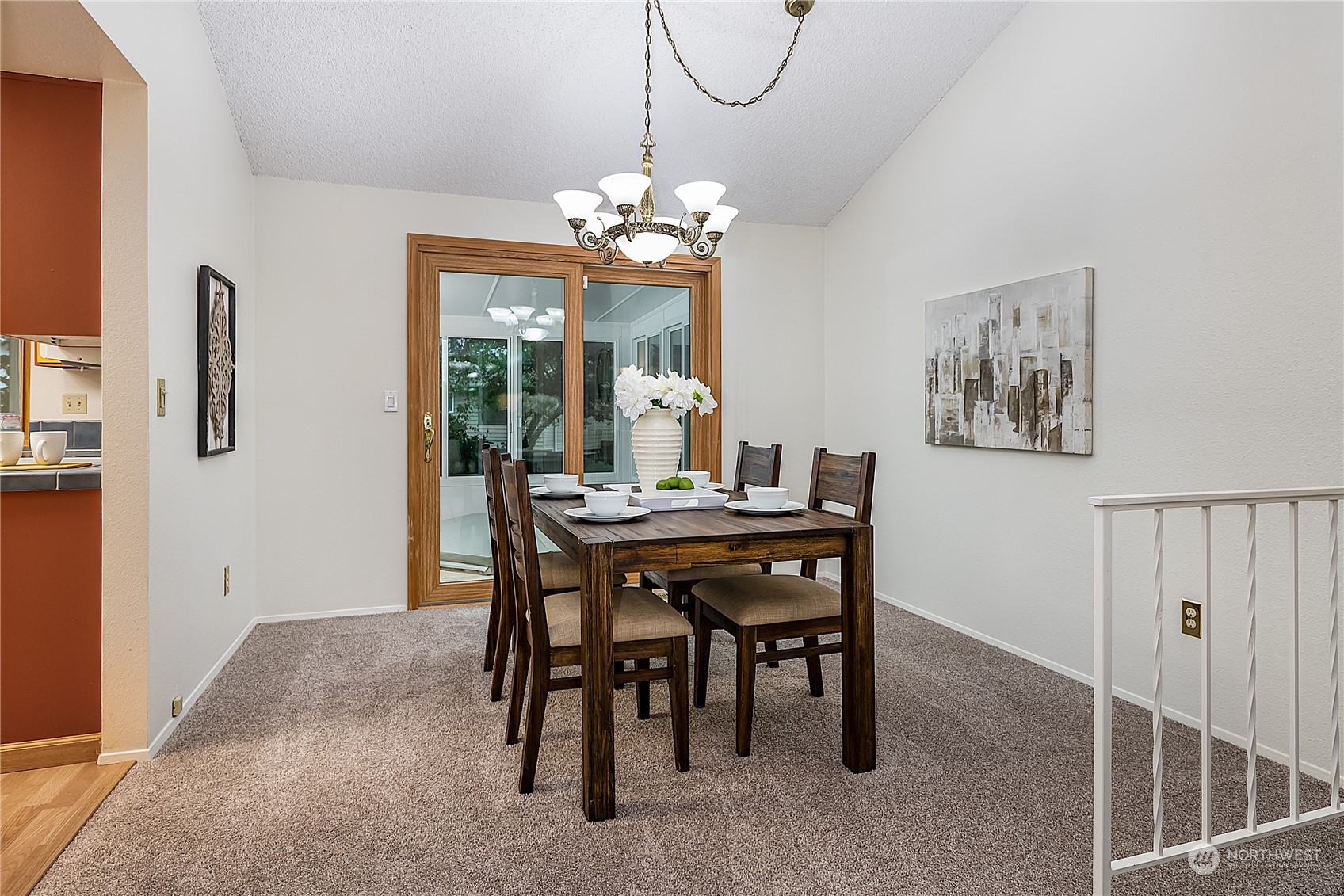2723 166th Street Southeast Bothell, WA 98012 - Photo 10 of 31 a dining room with furniture and chandelier