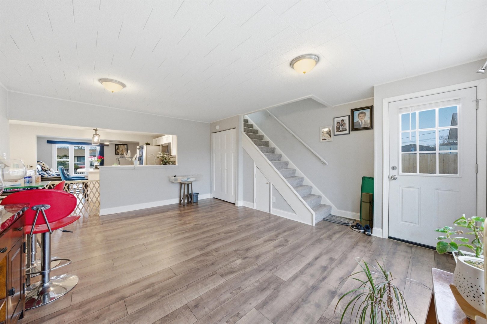 8945 South Corcoran Road Hometown, IL 60456 - Photo 15 of 24 a view of a room with wooden floor and stairs