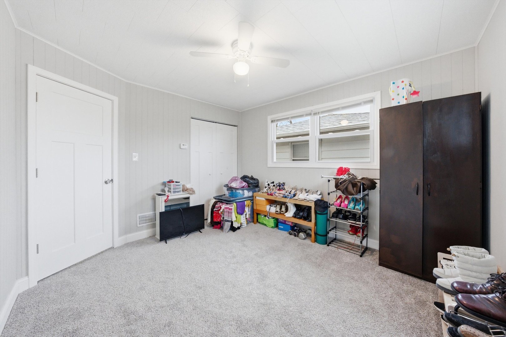 8945 South Corcoran Road Hometown, IL 60456 - Photo 19 of 24 a children room with toys and a ceiling fan