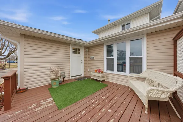 a front view of a house with a patio