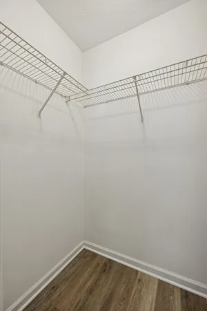 a view of a room with racks on the wall