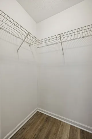 a view of a room with racks on the wall