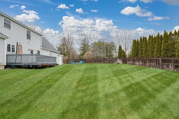 a view of a house with a big yard