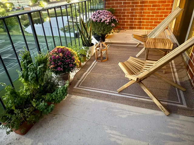 a view of entryway with flower pots