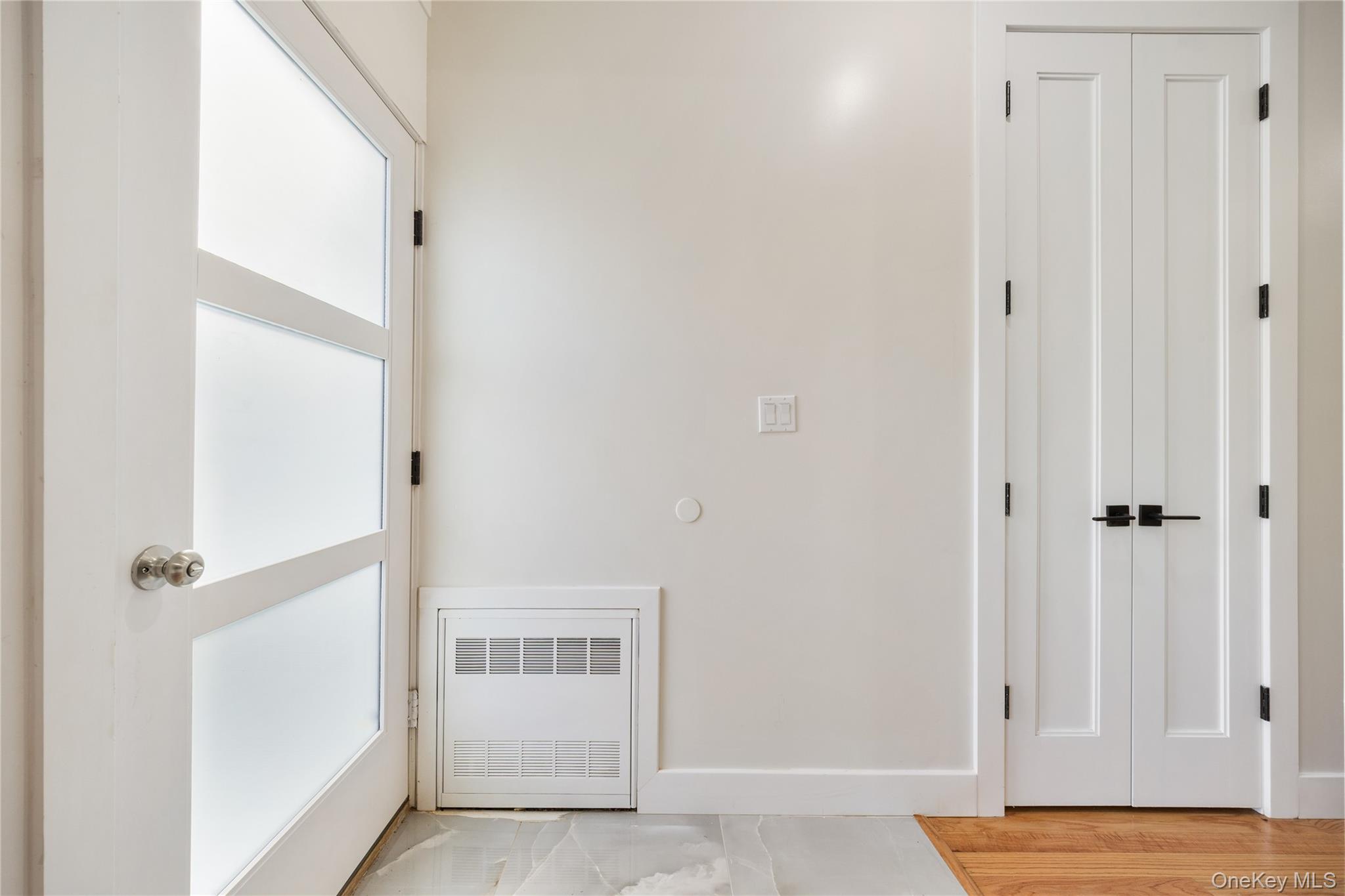 19 Lazer Court, Unit 102 Spring Valley, NY 10977 - Photo 4 of 31 a view of a bedroom with wooden floor