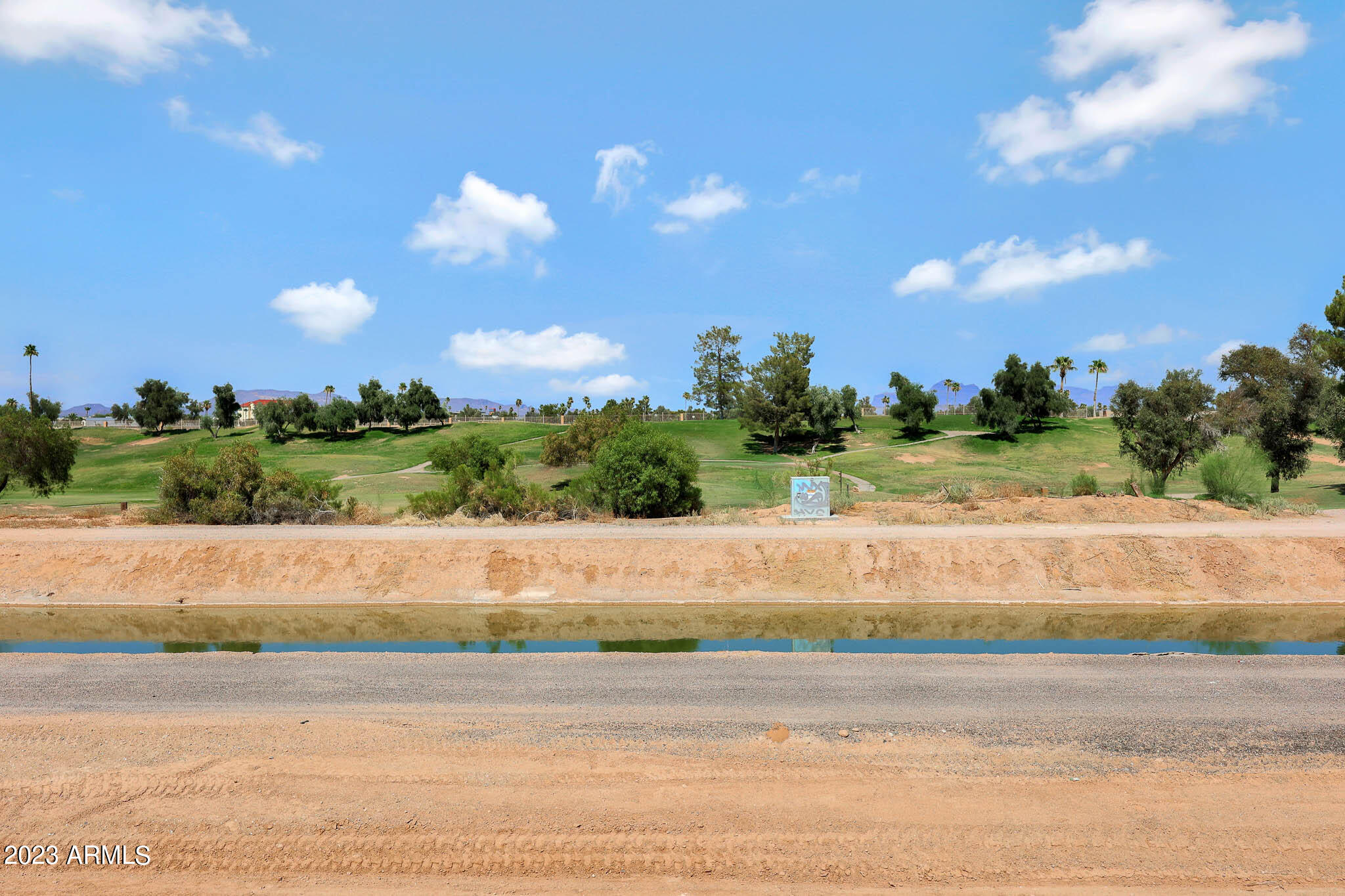 6060 East Baseline Road, Unit 103 Mesa, AZ 85206 - Photo 37 of 45 a view of a yard and basketball court